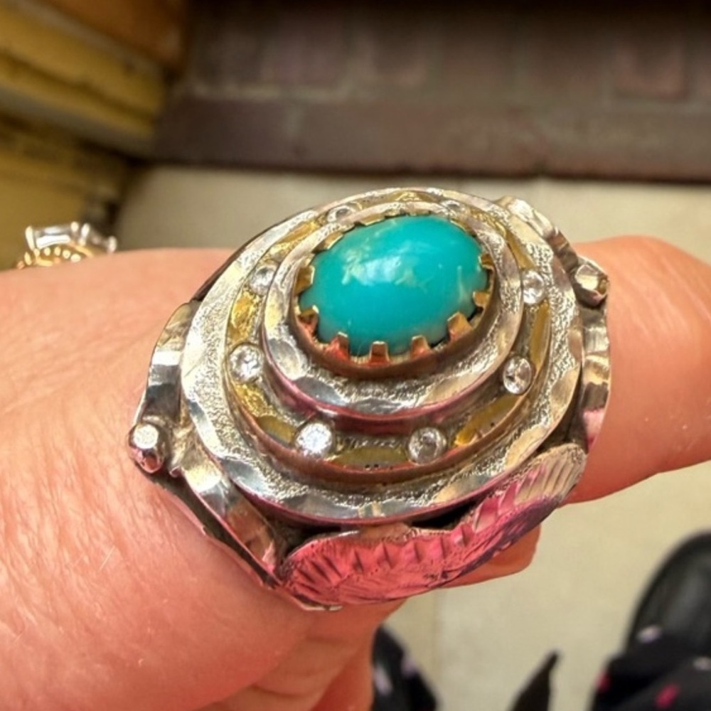 Handmade What a unique piece of jewelry Silver and Turquoise Ring
Size 10